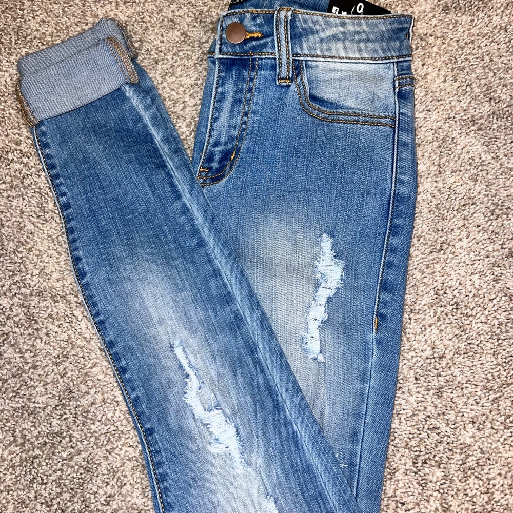 Fashion Nova Light Blue Distressed Skinny Jeans